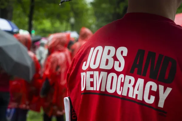 Photo of t-shirt saying Jobs and Democracy