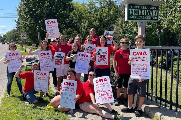 Group photo of Orchard Park Vet workers rally against union busting