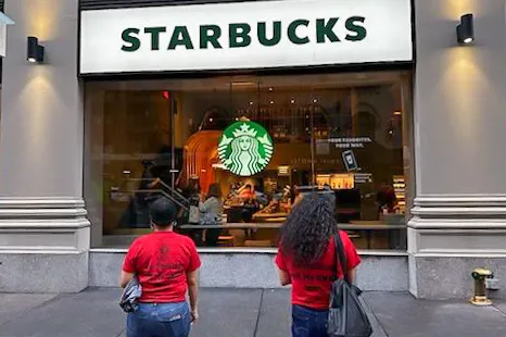 CWA Local 1101 members leafletting outside of Starbucks