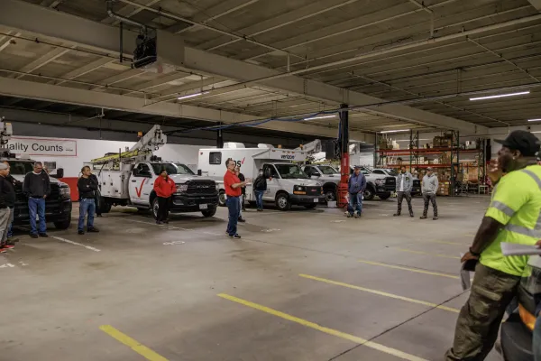 CWA Local 1104 Nick Hoh at garage visit for Broadband Brigade