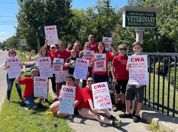 Group photo of Orchard Park Vet workers rally against union busting